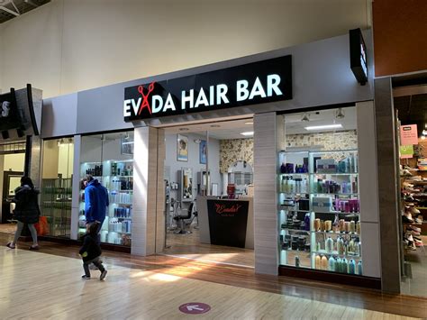 Nearby grocery stores include Safeway, Aldi, and GNC. . Evada hair bar
